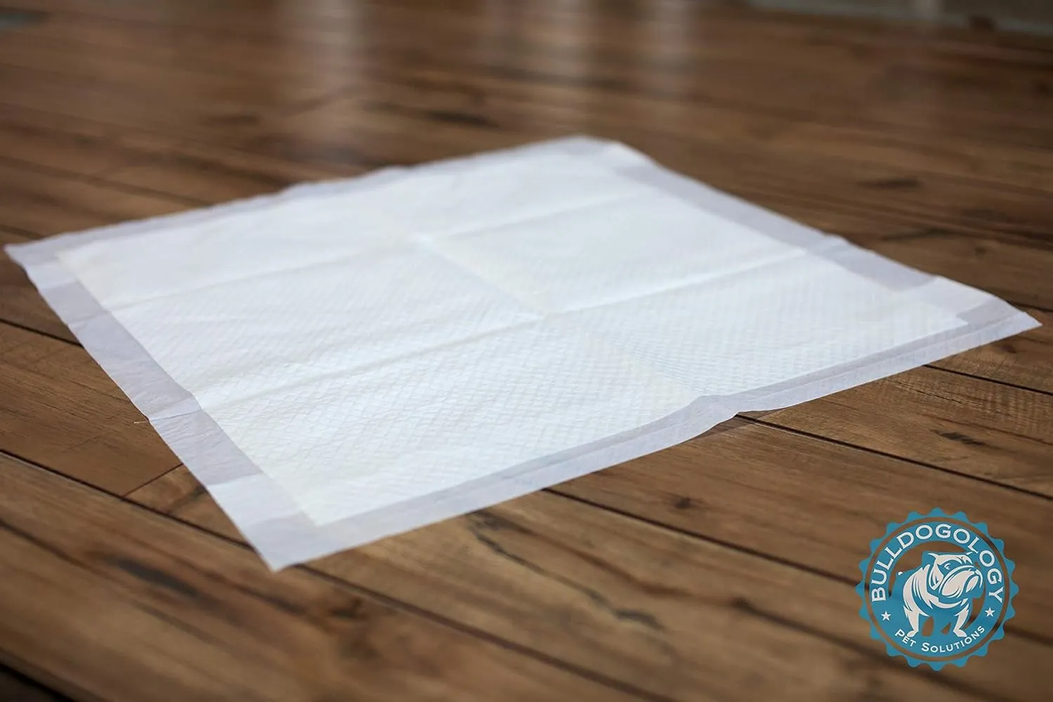 Bulldogology 50-Count Dog Puppy Pads (24x24) Large Pee Pads for Dogs - 6 Layer Pet Training Pads, Super Absorbent Puppy Pads with Adhesive Tabs for Small to Large Dogs